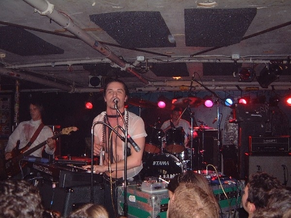 Tomahawk performing live on stage